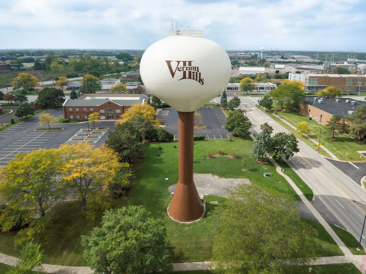 Aerial view of the Vernon Hills, IL water tower over the surrounding commercial district